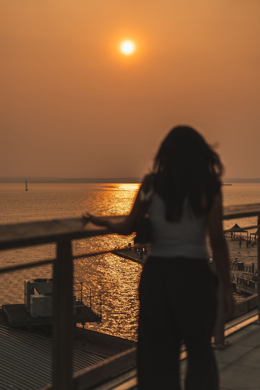 People photo — watching the sunset over the water